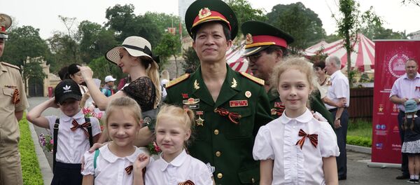 Những người tham gia hành động “Trung đoàn bất tử” tại Hà Nội. - Sputnik Việt Nam