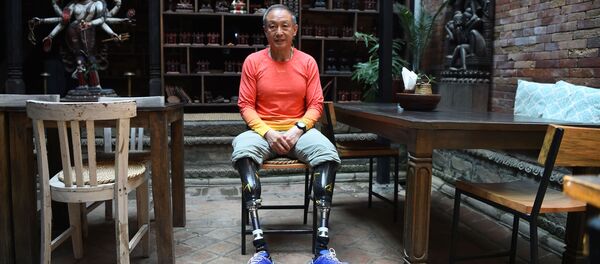 Vận động viên leo núi 70 tuổi bị cụt cả hai chân người Trung Quốc Xia Boyu - Sputnik Việt Nam