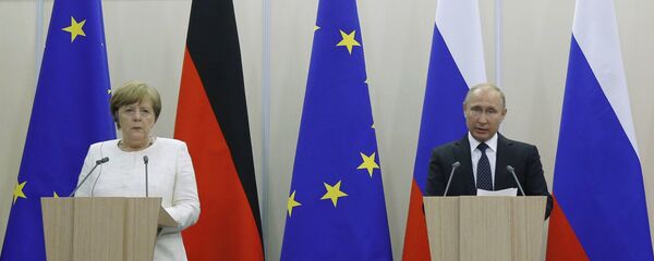 Vladimir Putin và Angela Merkel - Sputnik Việt Nam