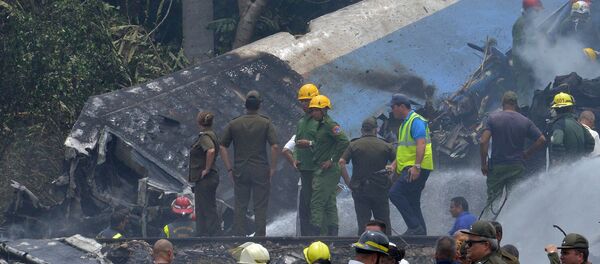 На месте крушения самолета Boeing 737 авиакомпании Cubana de Aviacion в Гаване, Куба На месте крушения самолета Boeing 737 авиакомпании Cubana de Aviacion в Гаване, Куба - Sputnik Việt Nam