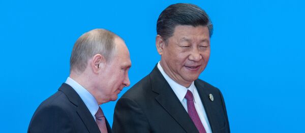 May 15, 2017. Russian President Vladimir Putin and Chinese President Xi Jinping, right, during the welcome ceremony for the heads of the delegations participating in the Belt and Road Forum, at the Yanqi Lake International Convention Center. - Sputnik Việt Nam