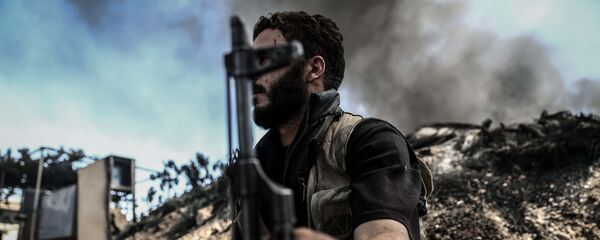 Các chiến binh từ liên minh quân nổi dậy Hồi giáo theo hướng Jaysh al-Islam ở Syria - Sputnik Việt Nam