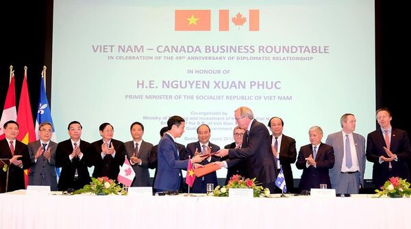 Đại diện Việt Nam - Canada ký một số bản ghi nhớ thỏa thuận hợp tác. - Sputnik Việt Nam
