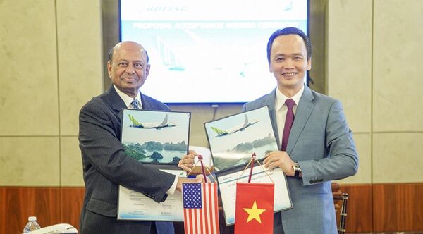 Chủ tịch Tập đoàn FLC Trịnh Văn Quyết và Phó Chủ tịch Boeing Dinesh Keskar thực hiện lễ ký kết. Chủ tịch Tập đoàn FLC Trịnh Văn Quyết và Phó Chủ tịch Boeing Dinesh Keskar thực hiện lễ ký kết. - Sputnik Việt Nam