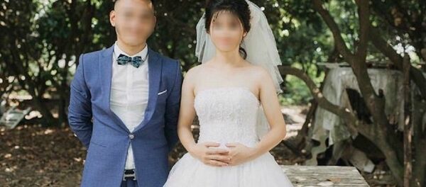 Vợ chồng anh L lúc mới cưới Vợ chồng anh L lúc mới cưới - Sputnik Việt Nam