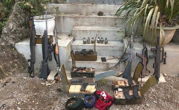 Vũ khí thu được tại nhà hai trùm ma túy. Vũ khí thu được tại nhà hai trùm ma túy. - Sputnik Việt Nam