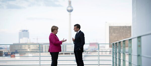 Angela Merkel và Emmanuel Macron - Sputnik Việt Nam