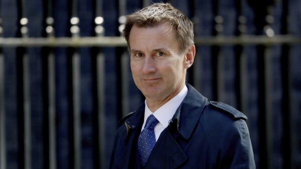 Britain's Health Secretary Jeremy Hunt arrives for a cabinet meeting at 10 Downing Street in London, Tuesday, May 1, 2018. - Sputnik Việt Nam