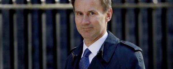 Britain's Health Secretary Jeremy Hunt arrives for a cabinet meeting at 10 Downing Street in London, Tuesday, May 1, 2018. Britain's Health Secretary Jeremy Hunt arrives for a cabinet meeting at 10 Downing Street in London, Tuesday, May 1, 2018. - Sputnik Việt Nam