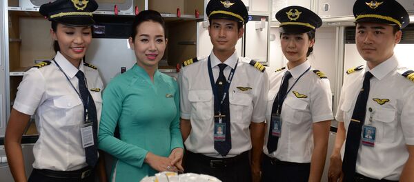 Phi công và tiếp viên của Hàng không Việt Nam (Vietnam Airlines) tại Hà Nội - Sputnik Việt Nam