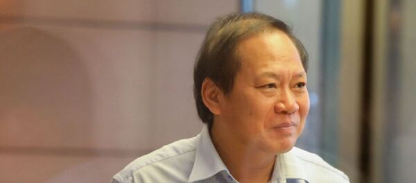 Bộ trưởng Thông tin truyền thông Trương Minh Tuấn bên hành lang kỳ họp thứ 5 Quốc hội khóa XIV hồi tháng 6-2018 - Sputnik Việt Nam