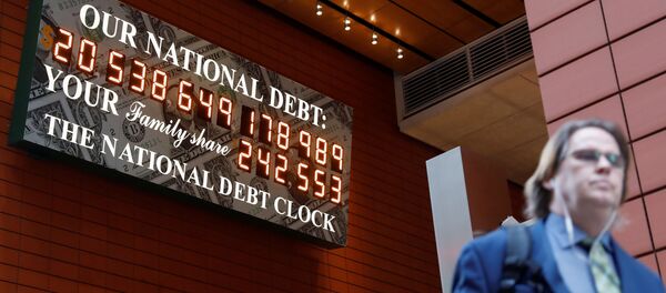 Счетчик государственного долга США на Манхэттене в Нью-Ийорке Счетчик государственного долга США на Манхэттене в Нью-Ийорке - Sputnik Việt Nam