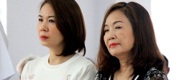 Bị cáo Ngô Thị Minh Phượng (bên phải). Bị cáo Ngô Thị Minh Phượng (bên phải). - Sputnik Việt Nam