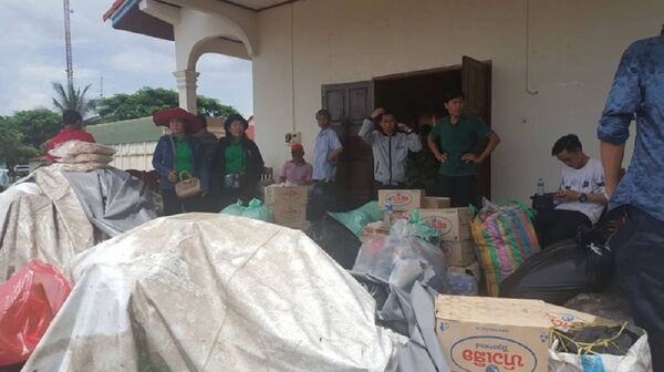 Lực lượng cứu trợ cùng các nhu yếu phẩm chuẩn bị lên đường cứu trợ người dân vù lụt - Sputnik Việt Nam