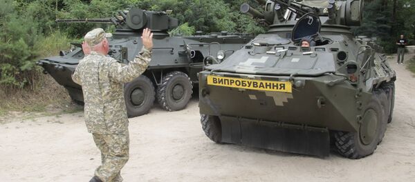 Xe bọc thép Ukraine ở Kiev Xe bọc thép Ukraine ở Kiev - Sputnik Việt Nam