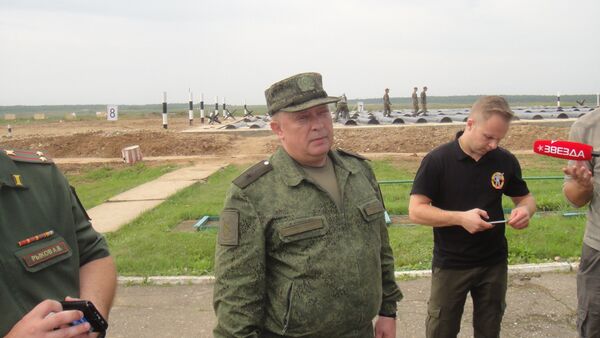 Trọng tài hạng mục thi xe tăng Tank biathlon 2018, thiếu tướng Roman Binyukov  - Sputnik Việt Nam