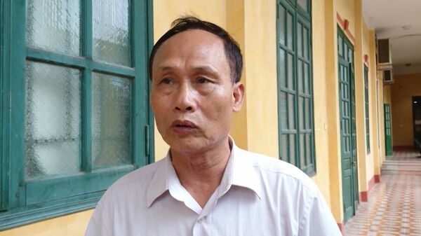 Ông Nguyễn Hữu Bất, trưởng ca trực chợ Gạo (TP Hưng Yên) Ông Nguyễn Hữu Bất, trưởng ca trực chợ Gạo (TP Hưng Yên) - Sputnik Việt Nam