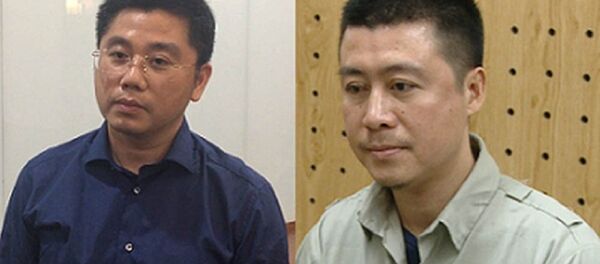 Bị can Nguyễn Văn Dương (đeo kính) và Phan Sào Nam. - Sputnik Việt Nam