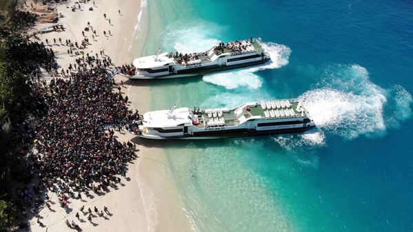 Dân chuẩn bị sơ tán trên đảo Gili Trawangan, Lombok, Indonesia - Sputnik Việt Nam