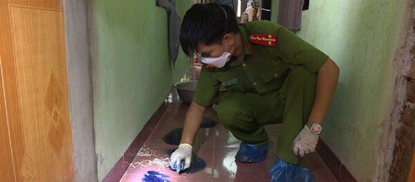 Cơ quan công an tiến hành khám nghiệm hiện trường. Cơ quan công an tiến hành khám nghiệm hiện trường. - Sputnik Việt Nam