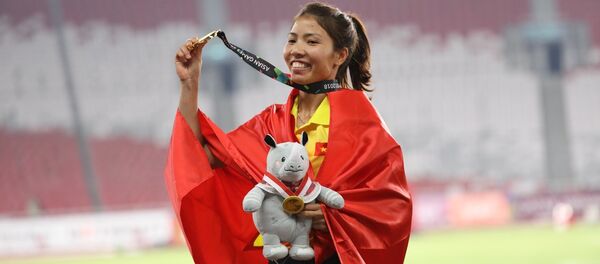 Bùi Thị Thu Thảo đã xuất sắc giành tấm huy chương vàng thứ 2 cho đoàn thể thao Việt Nam tại ASIAD 2018. Bùi Thị Thu Thảo đã xuất sắc giành tấm huy chương vàng thứ 2 cho đoàn thể thao Việt Nam tại ASIAD 2018. - Sputnik Việt Nam