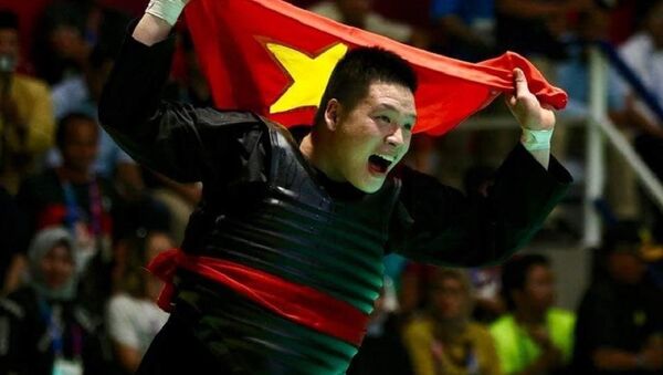 Võ sỹ Nguyễn Văn Trí giành HCV môn Pencak Silat tại ASIAD 2018.  - Sputnik Việt Nam