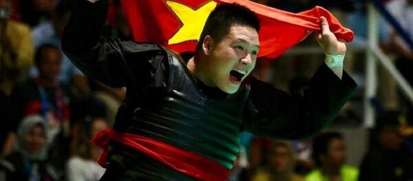 Võ sỹ Nguyễn Văn Trí giành HCV môn Pencak Silat tại ASIAD 2018.  - Sputnik Việt Nam