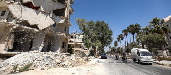 Разрушенные здания в городе Идлиб, Сирия Разрушенные здания в городе Идлиб, Сирия - Sputnik Việt Nam