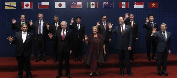 Đại diện của các quốc gia - thành viên Hiệp ước Quan hệ đối tác xuyên Thái Bình Dương chụp ảnh sau lễ ký kết tại Santiago, Chile - Sputnik Việt Nam