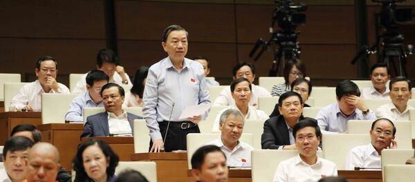 Bộ trưởng Bộ Công an Tô Lâm trả lời chất vấn của các Đại biểu Quốc hội. Bộ trưởng Bộ Công an Tô Lâm trả lời chất vấn của các Đại biểu Quốc hội. - Sputnik Việt Nam