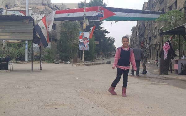 Nhân dân Syria và Palestine cùng nhau khôi phục quận Yarmuk ở Damascus - Sputnik Việt Nam