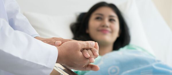 phụ nữ tại bệnh viện - Sputnik Việt Nam