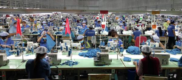 Sản xuất may mặc tại Công ty TNHH Far Eastern New Apparel Việt Nam - KCN Bắc Đồng Phú, tỉnh Bình Phước. Sản xuất may mặc tại Công ty TNHH Far Eastern New Apparel Việt Nam - KCN Bắc Đồng Phú, tỉnh Bình Phước. - Sputnik Việt Nam