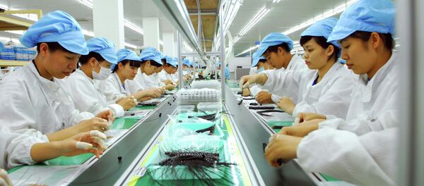 Dây chuyền sản xuất thiết bị điện tử tại Công ty TNHH Bluecom Vina, 100% vốn đầu tư của Hàn Quốc, tại khu công nghiệp Tràng Duệ (Hải Phòng). - Sputnik Việt Nam