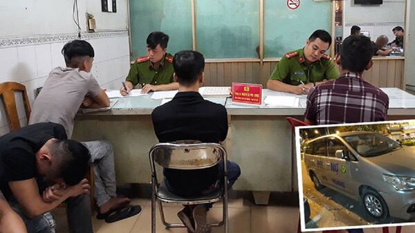 Nhóm người cùng ô tô dán dòng chữ “ĐÒI NỢ BẢO HOÀNG” - Sputnik Việt Nam