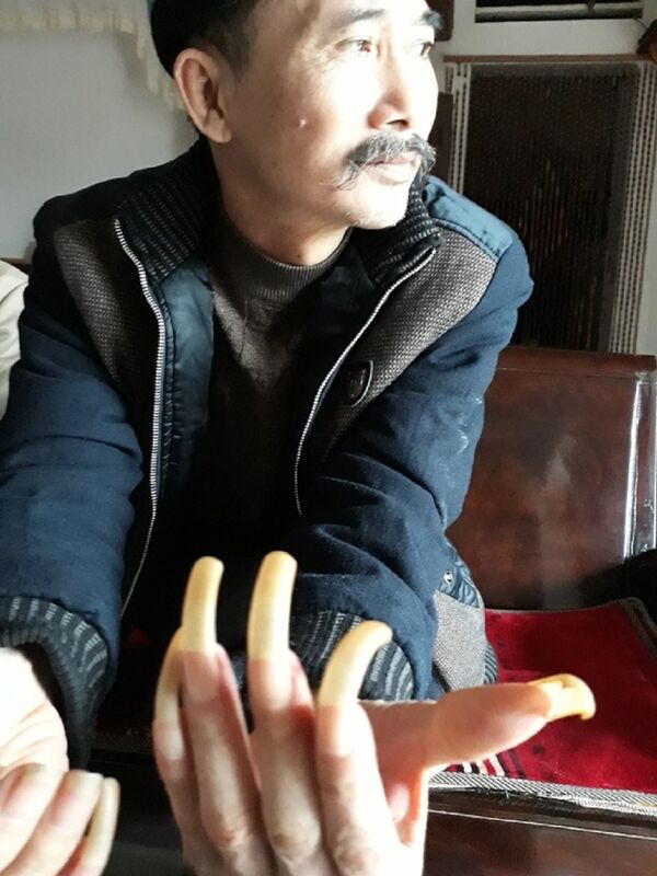 Móng tay ông Năm 1.177 ngày không được cắt  - Sputnik Việt Nam