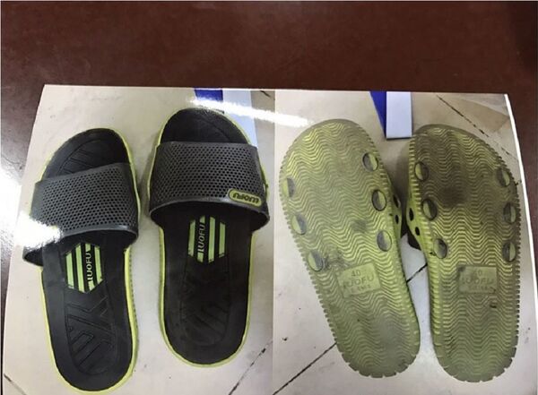  Dép nghi của hung thủ thu giữ trên taxi - Sputnik Việt Nam