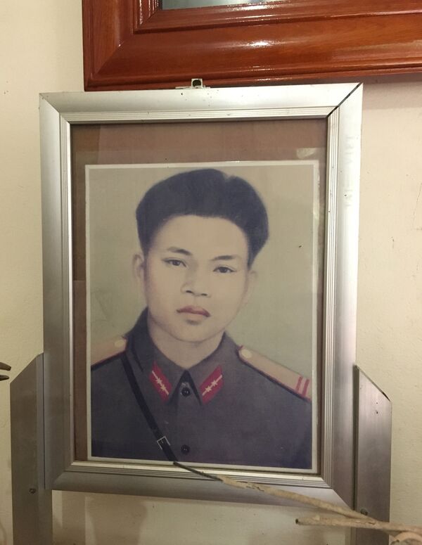 Di ảnh liệt sỹ Lê Văn Huỳnh - Sputnik Việt Nam