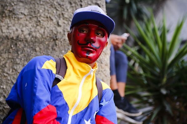 Những người tham gia cuộc biểu tình ở Caracas ủng hộ thủ lĩnh phe đối lập Juan Guaido, tự xưng là tổng thống lâm thời Venezuela - Sputnik Việt Nam