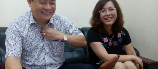 Ông Trần Đức Trung và bà Hằng - Sputnik Việt Nam