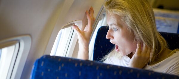 người phụ nữ đi máy bay - Sputnik Việt Nam