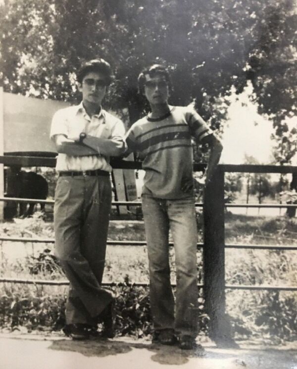 Những bức ảnh tư liệu về ông Ri bên gia đình thầy Chính. - Sputnik Việt Nam