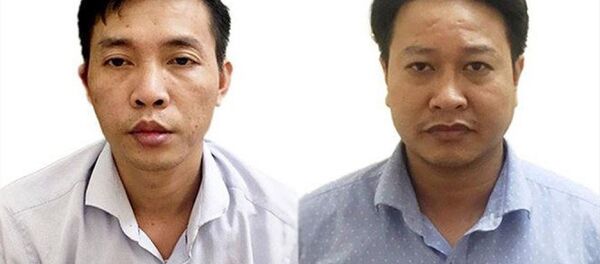 Hai bị can Đỗ Mạnh Tuấn và Nguyễn Khắc Tuấn trực tiếp sửa bài thi - Sputnik Việt Nam