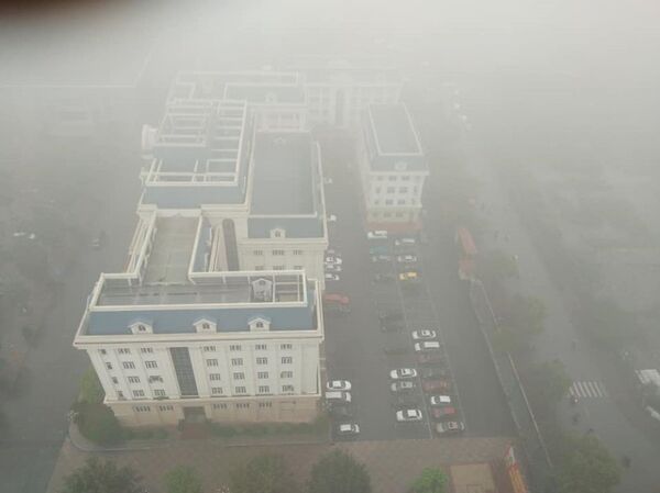 Sáng ngày 19/3, Thành phố Hà Nội chìm trong sương mù. - Sputnik Việt Nam