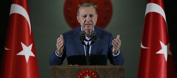 Turkey's President Recep Tayyip Erdogan speaks during an Iftar, the evening meal breaking the Ramadan fast, at his palace in Ankara, Turkey, Saturday, May 19, 2018 - Sputnik Việt Nam