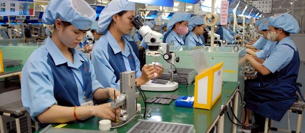 Sản xuất linh kiện điện tử tại Nhà máy Canon thuộc Khu Công nghiệp Phố Nối A (Hưng Yên). Sản xuất linh kiện điện tử tại Nhà máy Canon thuộc Khu Công nghiệp Phố Nối A (Hưng Yên). - Sputnik Việt Nam