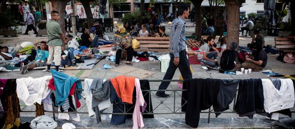 Người tị nạn Trung Đông ở Athens. Người tị nạn Trung Đông ở Athens. - Sputnik Việt Nam