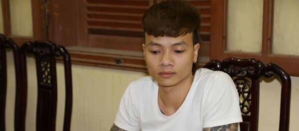 Đối tượng Ngô Bá Khá khi bị bắt. Đối tượng Ngô Bá Khá khi bị bắt. - Sputnik Việt Nam