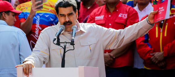 Tổng thống Venezuela Nicolas Maduro phát biểu tại Caracas trong cuộc mit tinh ủng hộ ông - Sputnik Việt Nam