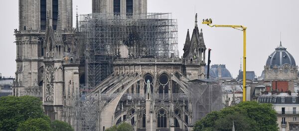 Nhà thờ Đức Bà Paris sau đám cháy Nhà thờ Đức Bà Paris sau đám cháy - Sputnik Việt Nam